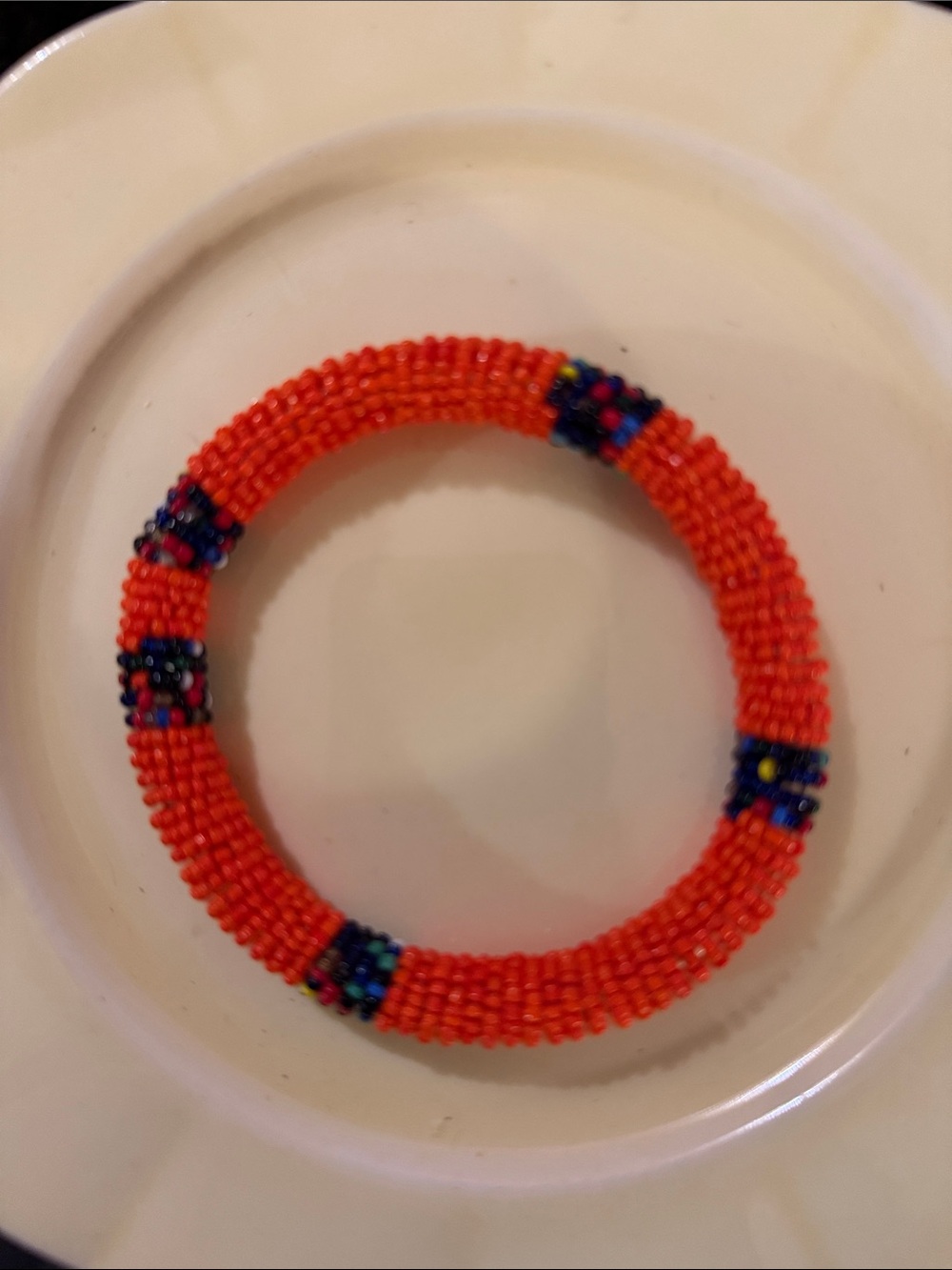 Source Unknown Bright Orange Beaded Bracelet with Blue Accents